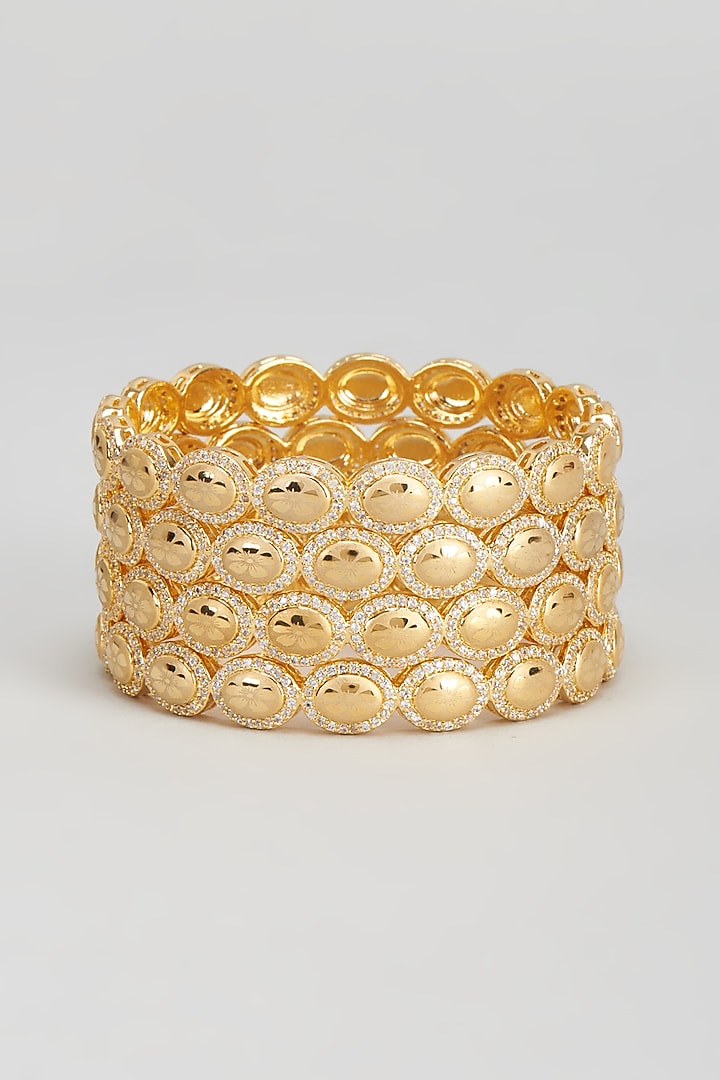 Gold Finish Zircon Bangles (Set of 4) by Aster at Pernia's Pop Up Shop