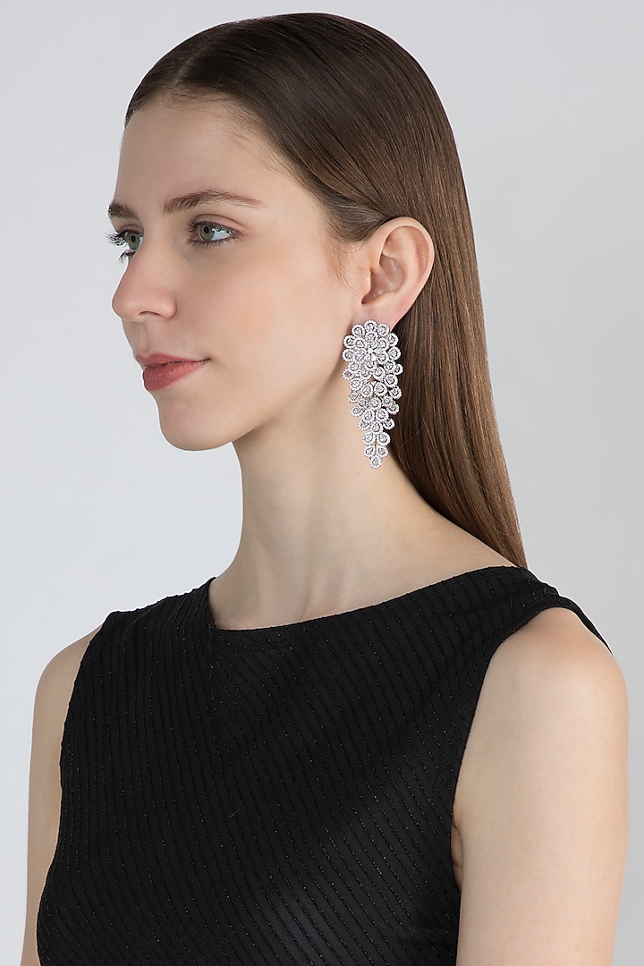 White Finish Earrings With Faux Diamonds by Aster