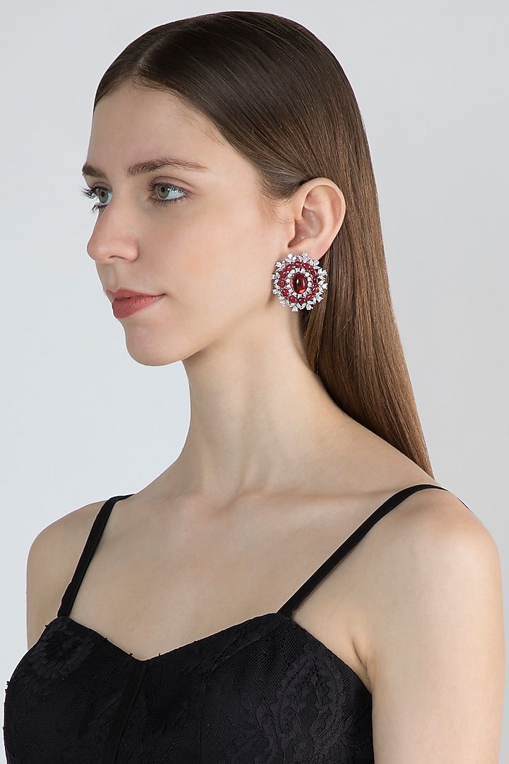 White Finish Stud Earrings With Red Stone by Aster at Pernia's Pop Up Shop