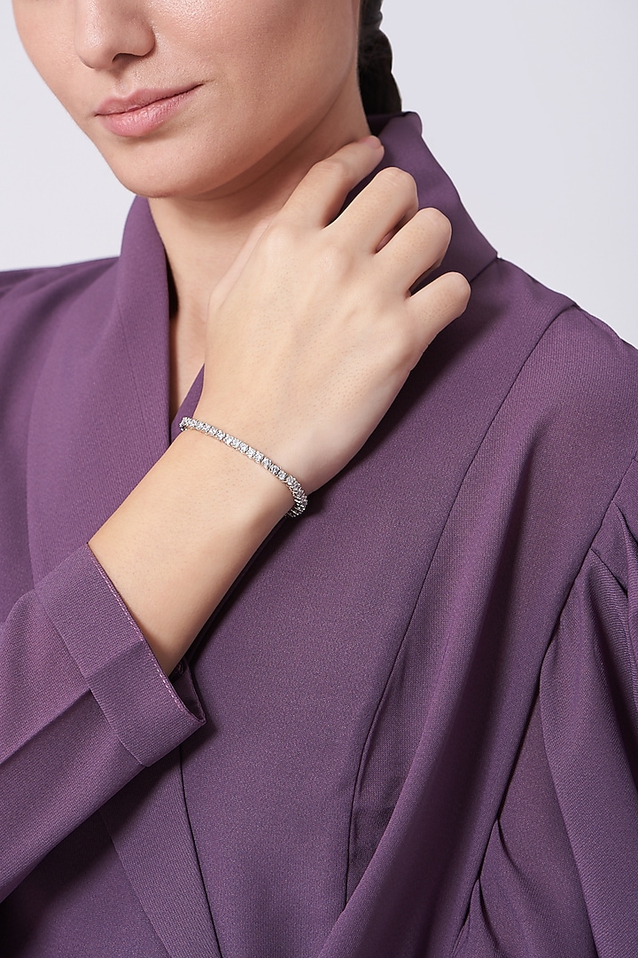 White Finish Faux Diamonds Tennis Bracelet by Aster at Pernia's Pop Up Shop