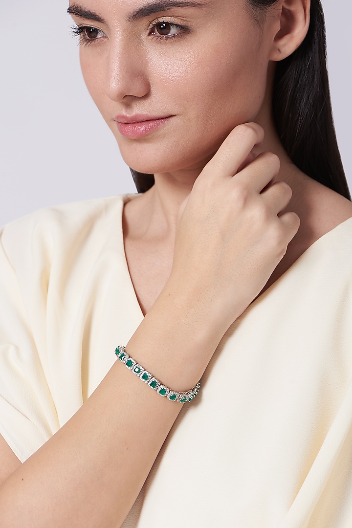 White Finish Zircons & Faux Diamonds Tennis Bracelet by Aster at Pernia's Pop Up Shop