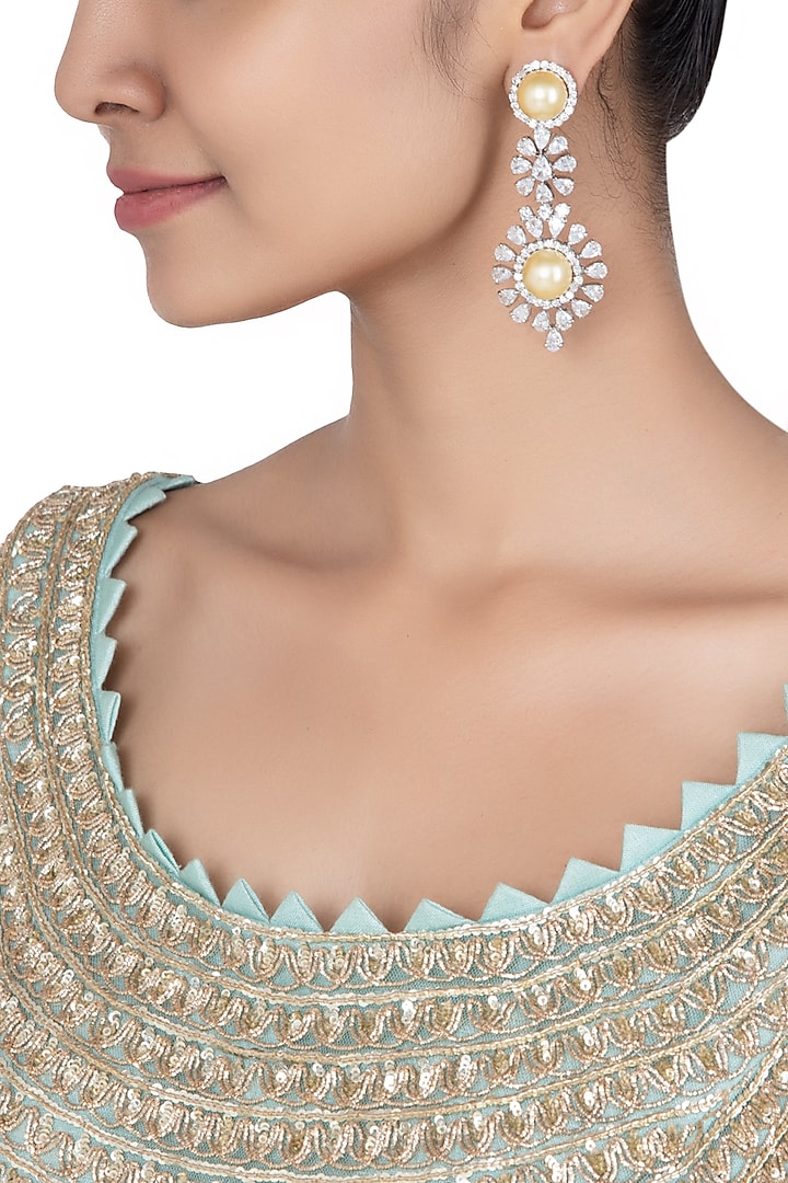 Silver plated yellow pearl and diamond faux earrings available only at Pernia's Pop Up Shop.
