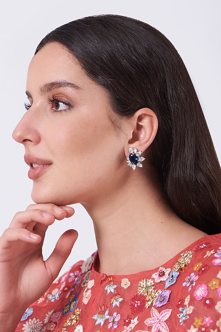 White Finish Blue Stone & Zircon Stud Earrings by Aster at Pernia's Pop Up Shop