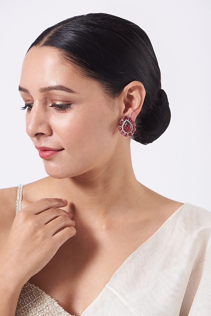 White Finish Stud Earrings With Red Stones by Aster at Pernia's Pop Up Shop