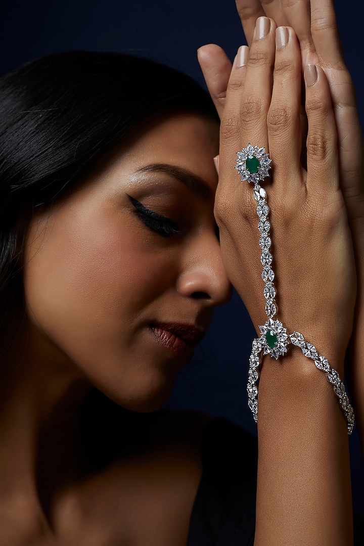 White Finish Zircon & Green Stone Haathphool (Set Of 2) by Aster at Pernia's Pop Up Shop