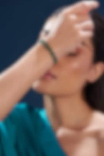 White Finish Zircon & Green Synthetic Stone Bracelet by Aster at Pernia's Pop Up Shop