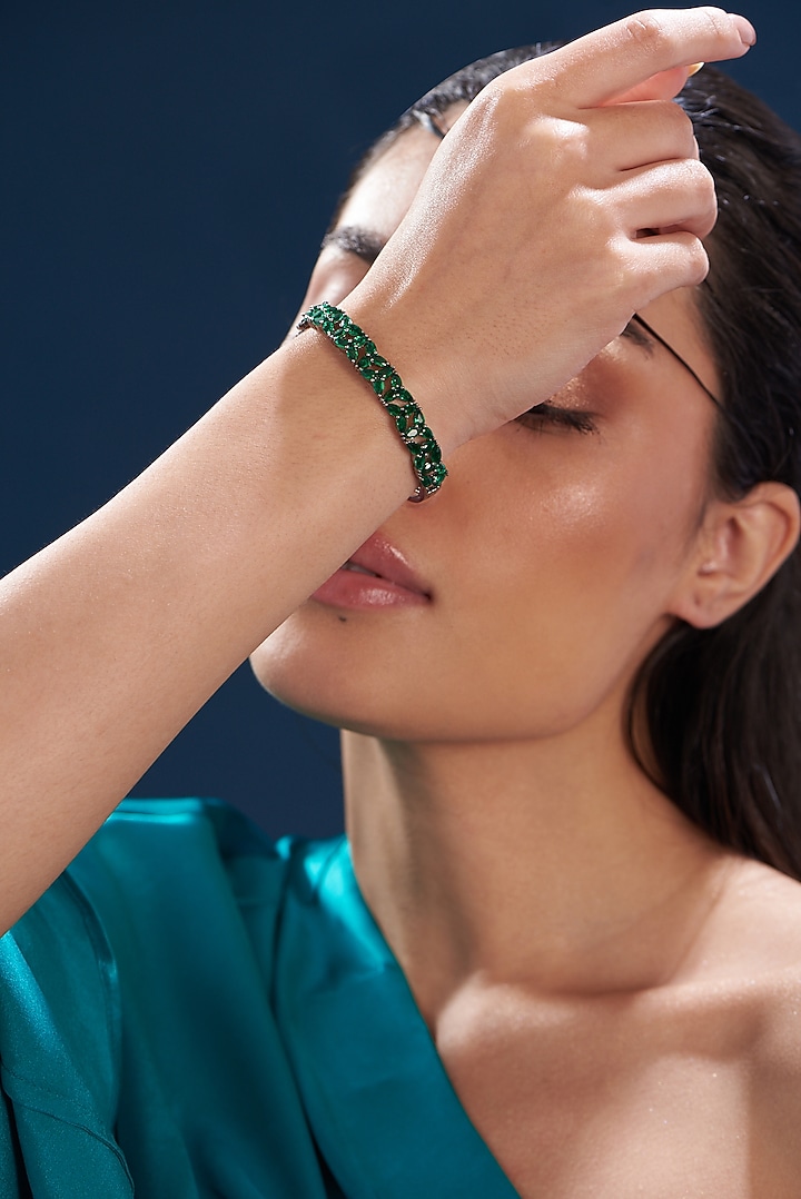 White Finish Zircon & Green Synthetic Stone Bracelet by Aster at Pernia's Pop Up Shop