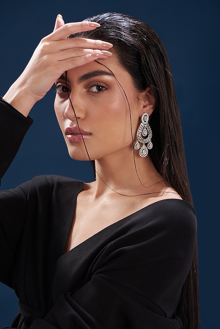 White Finish Zircon Dangler Earrings by Aster at Pernia's Pop Up Shop