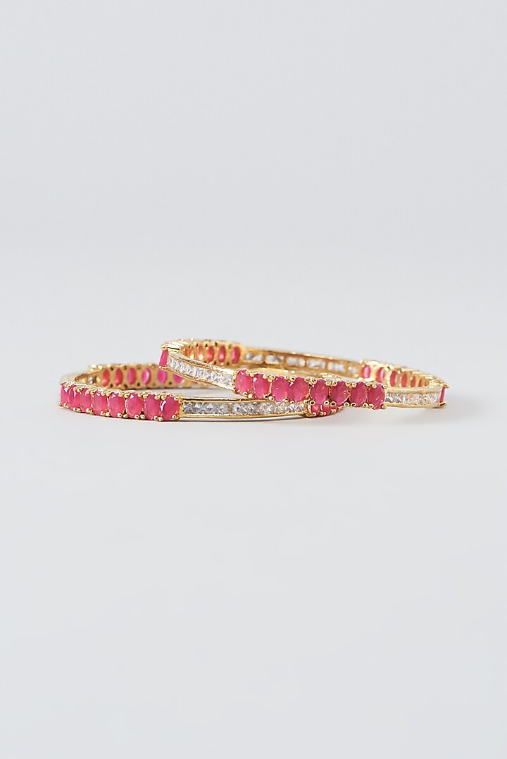 Gold Finish Red Zircon Bangles (Set Of 2) by Aster at Pernia's Pop Up Shop