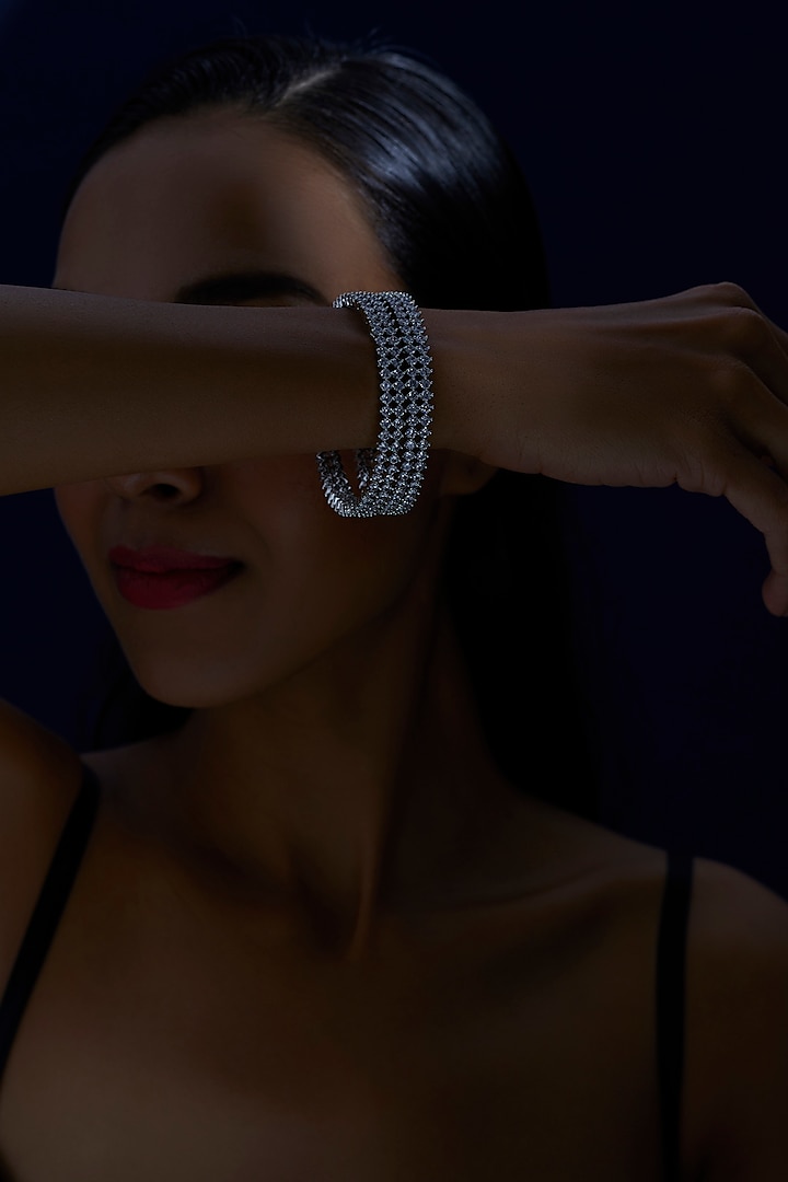 White Finish Zircon Bangles (Set of 2) by Aster at Pernia's Pop Up Shop