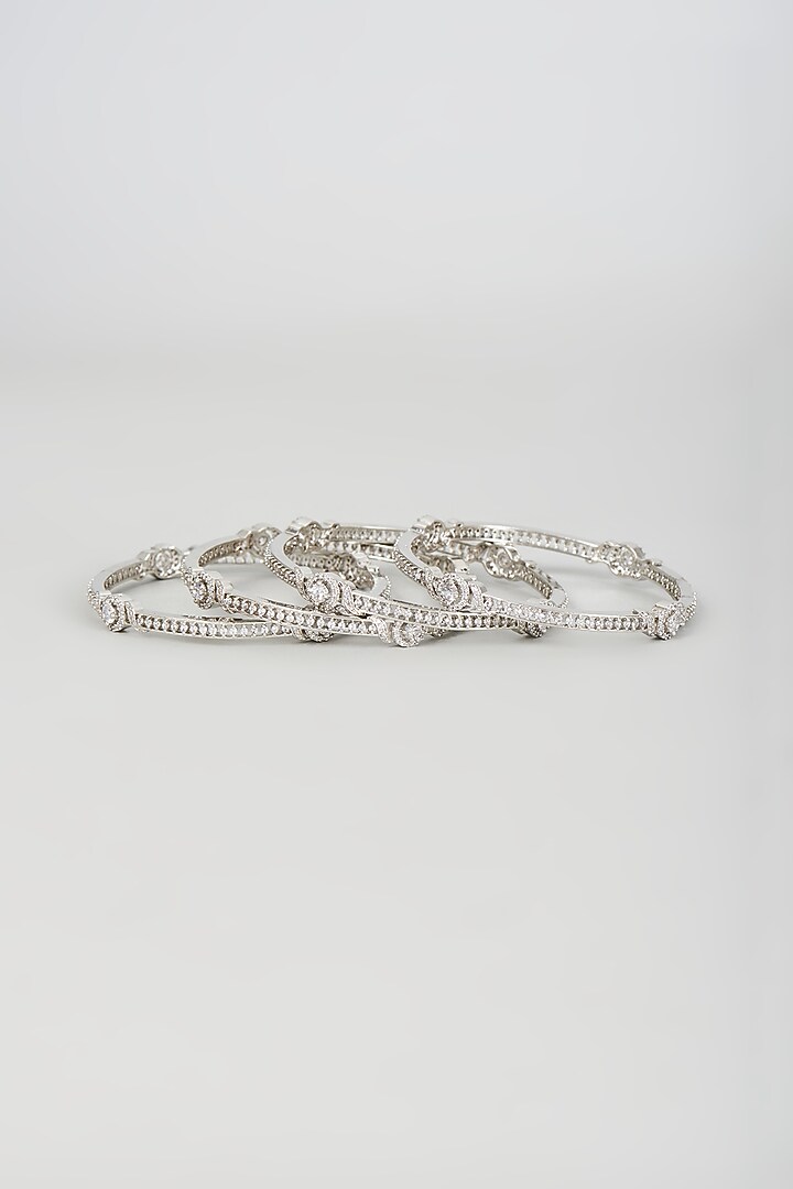 White Finish Zircon Bangles (Set of 4) by Aster at Pernia's Pop Up Shop