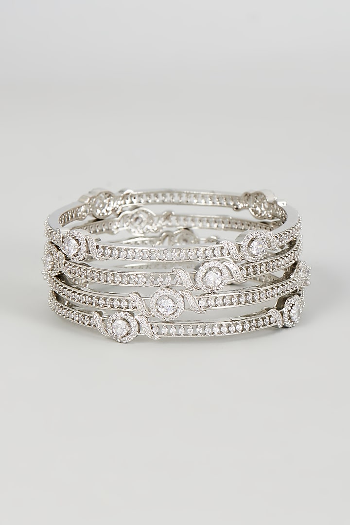 White Finish Zircon Bangles (Set of 4) by Aster at Pernia's Pop Up Shop
