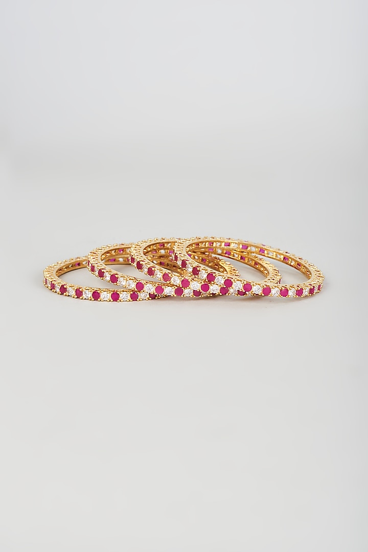 Gold Finish Zircon & Red Stone Bangles (Set of 4) by Aster at Pernia's Pop Up Shop