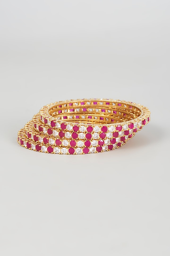 Gold Finish Zircon & Red Stone Bangles (Set of 4) by Aster at Pernia's Pop Up Shop
