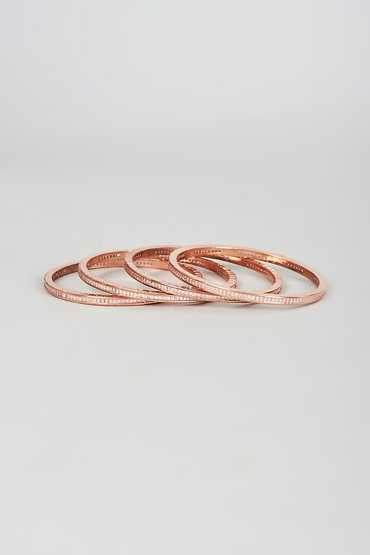 Rose Gold Finish Zircon Bangles (Set of 4) by Aster at Pernia's Pop Up Shop