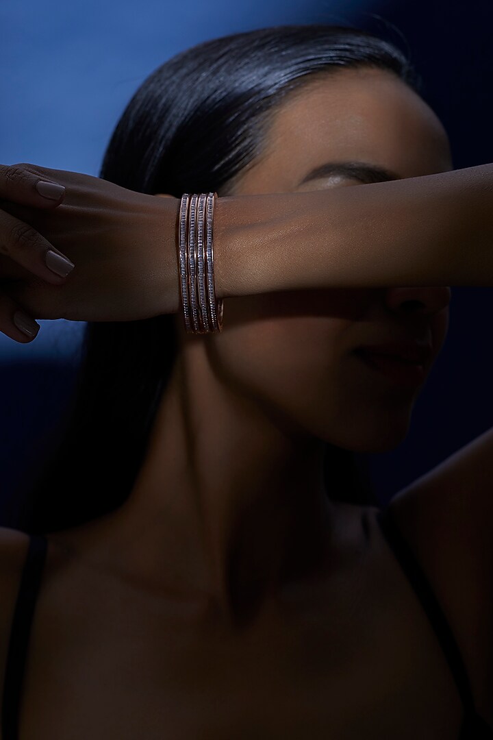 Rose Gold Finish Zircon Bangles (Set of 4) by Aster at Pernia's Pop Up Shop