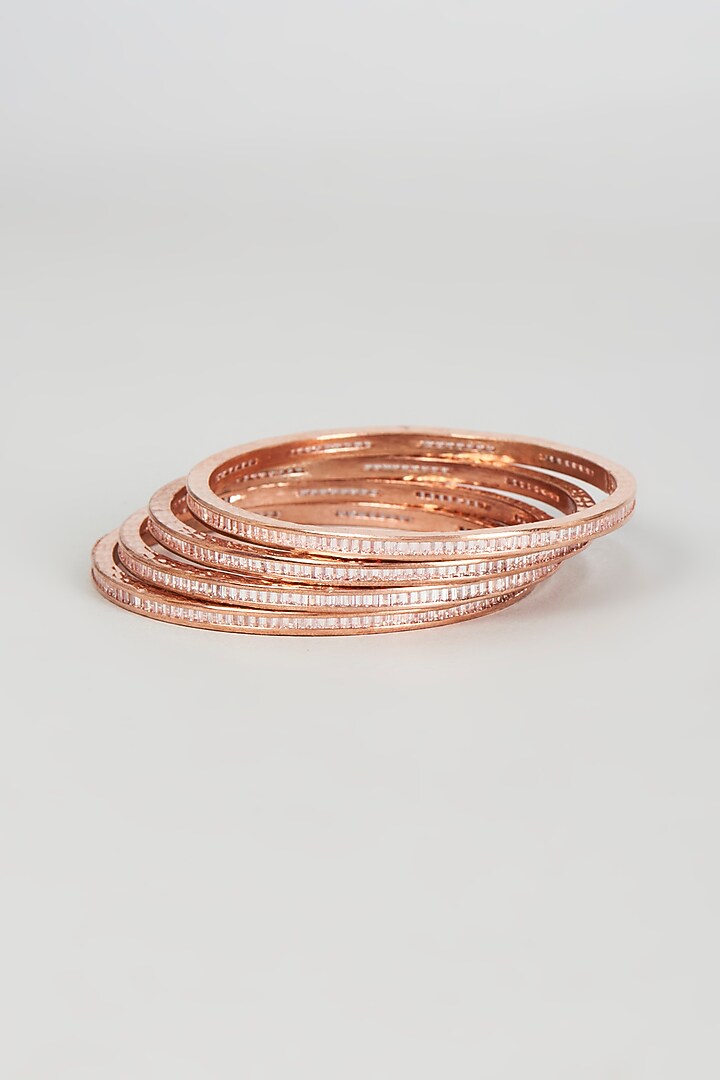 Rose Gold Finish Zircon Bangles (Set of 4) by Aster at Pernia's Pop Up Shop