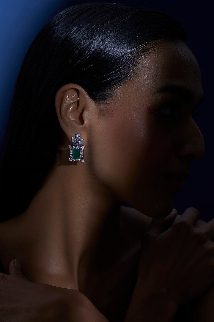 White Finish Zircon & Green Synthetic Stone Dangler Earrings by Aster at Pernia's Pop Up Shop