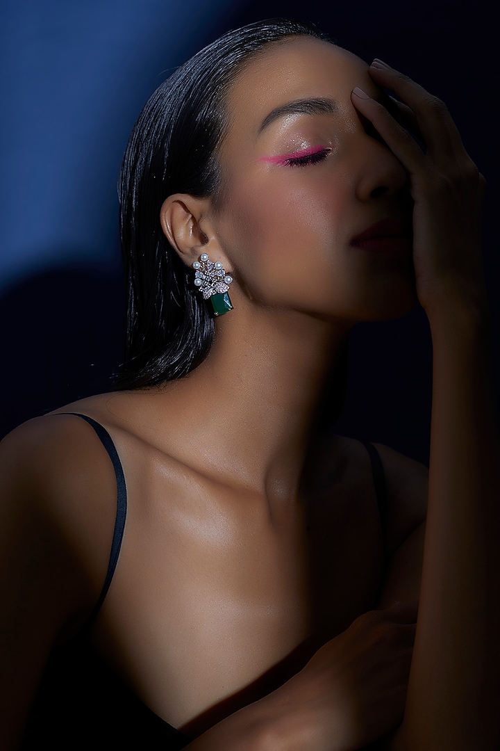 White Finish Zircon & Green Synthetic Stone Stud Earrings by Aster at Pernia's Pop Up Shop