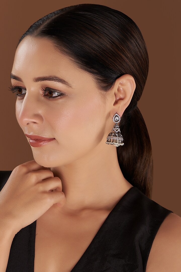 White Finish Faux Diamond Jhumka Earrings by Aster at Pernia's Pop Up Shop