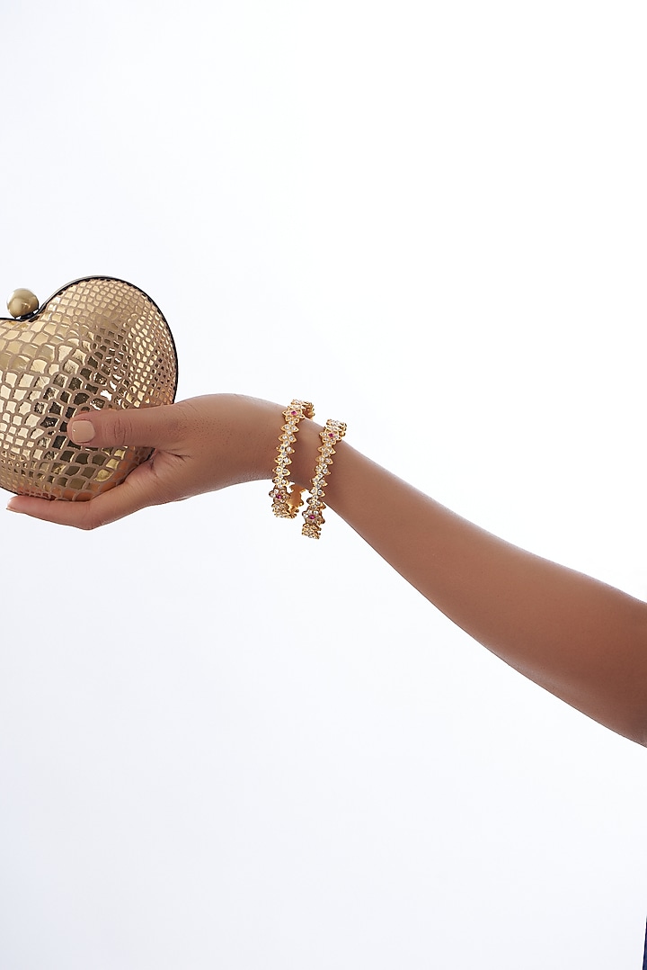 Gold Finish Zircon & Red Stone Bangles (Set of 2) by Aster at Pernia's Pop Up Shop