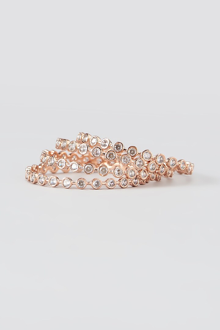 Rose Gold Finish Faux Diamond Bangles (Set of 4) by Aster at Pernia's Pop Up Shop