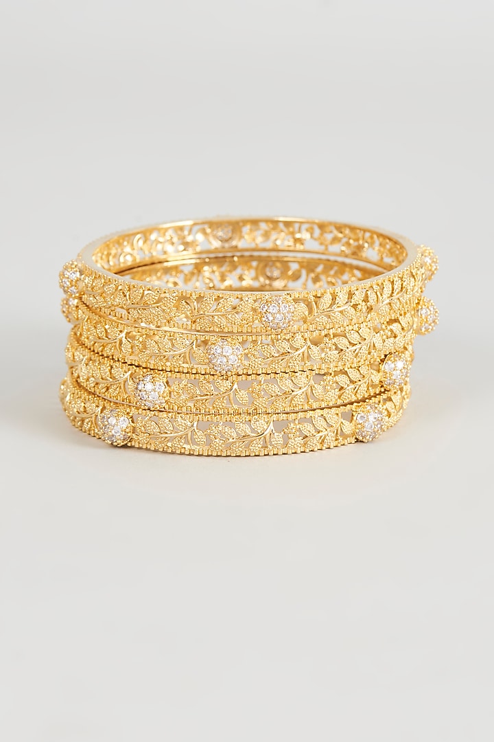 Gold Finish Zircon Bangles (Set of 4) by Aster at Pernia's Pop Up Shop