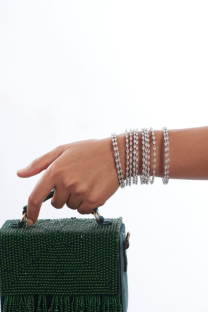 White Finish Zircon Bangles (Set of 12) by Aster at Pernia's Pop Up Shop