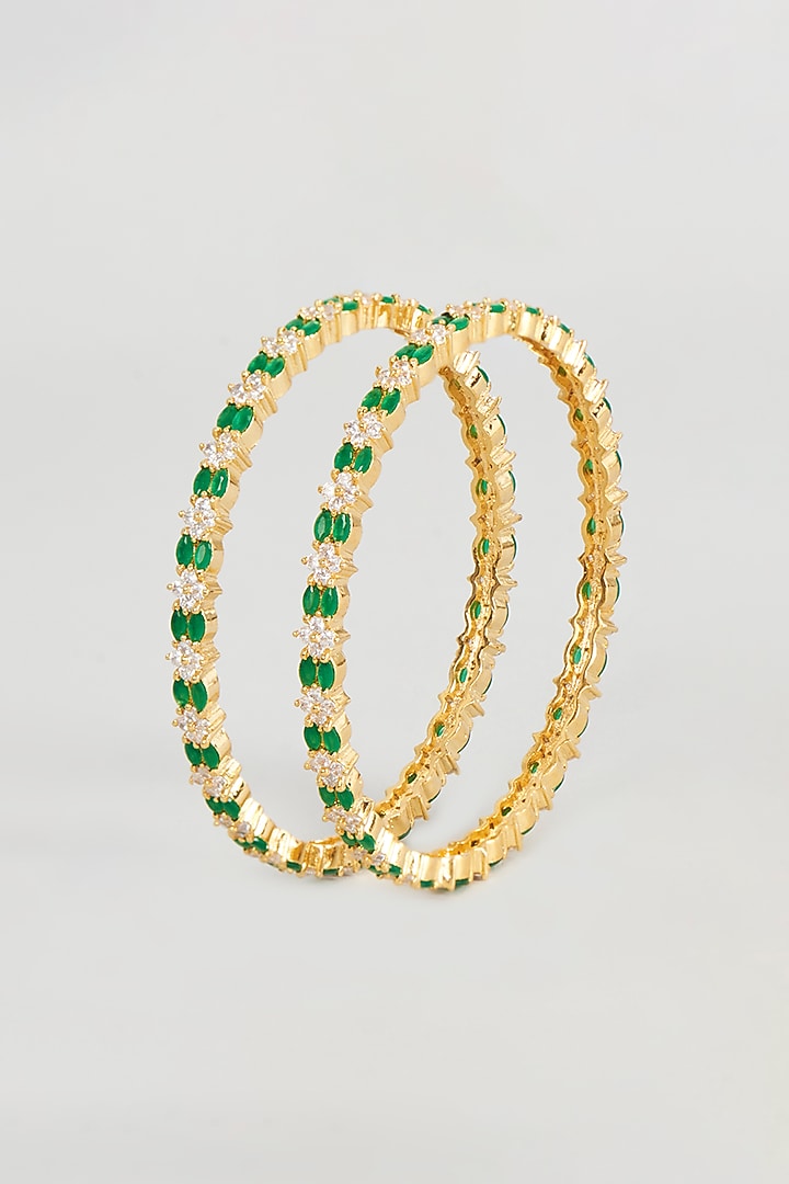 Gold Finish Emerald & Zircon Bangles (Set of 2) by Aster at Pernia's Pop Up Shop