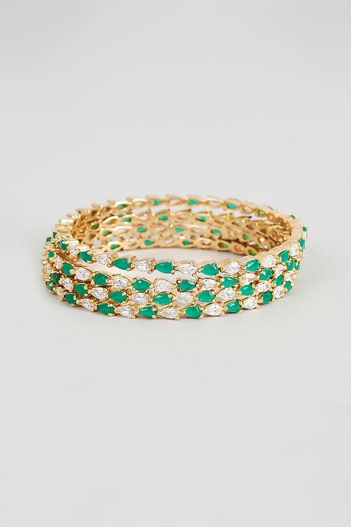 Gold Finish Zircon & Emerald Bangles (Set of 4) by Aster at Pernia's Pop Up Shop