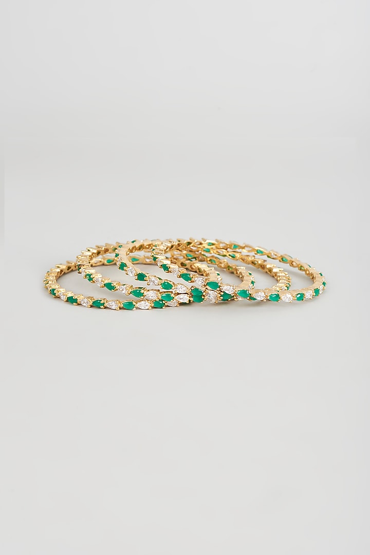 Gold Finish Zircon & Emerald Bangles (Set of 4) by Aster at Pernia's Pop Up Shop