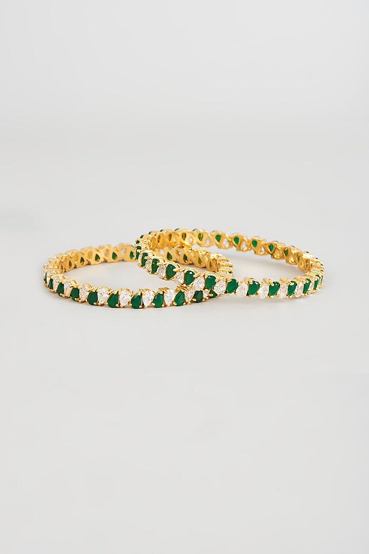 Gold Finish Zircon & Emerald Synthetic Stone Bangles (Set of 2) by Aster at Pernia's Pop Up Shop