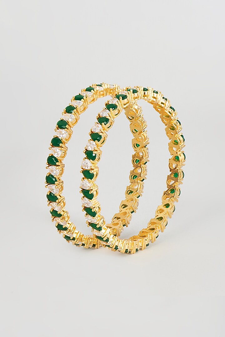 Gold Finish Zircon & Emerald Synthetic Stone Bangles (Set of 2) by Aster at Pernia's Pop Up Shop
