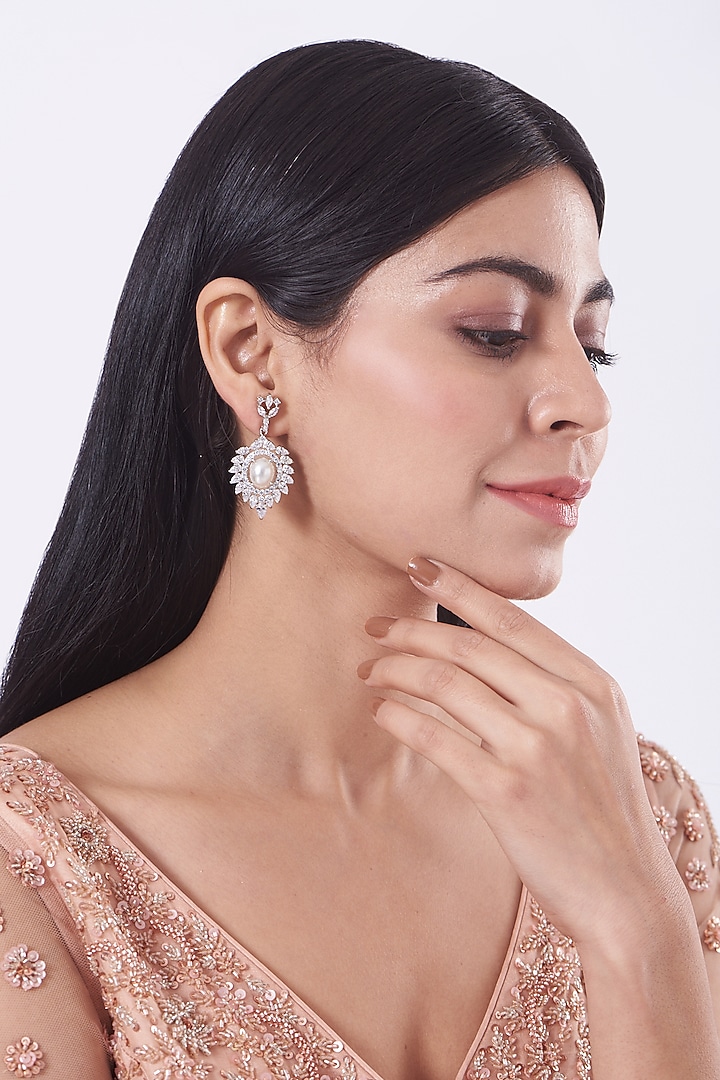 White Finish Faux Diamond & Pearl Earrings by Aster at Pernia's Pop Up Shop