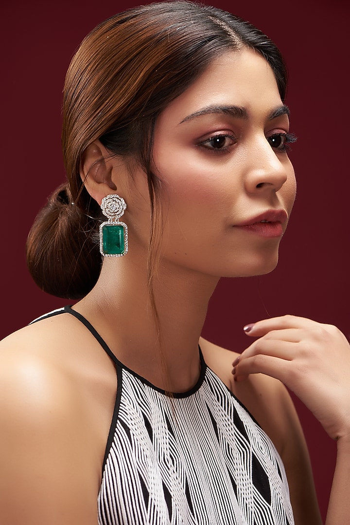 White Finish Faux Doublet Diamond & Emerald Dangler Earrings by Aster at Pernia's Pop Up Shop