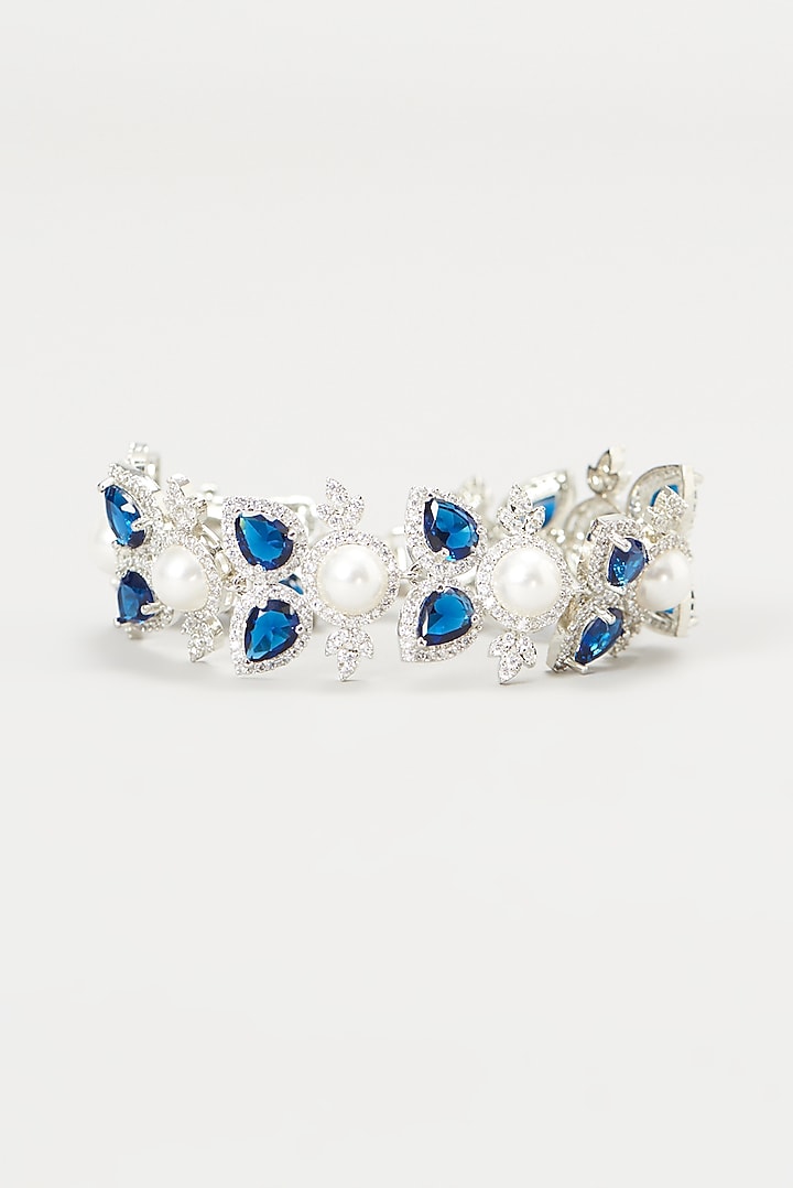 White Finish Faux Diamond & Sapphire Stone Bracelet by Aster at Pernia's Pop Up Shop