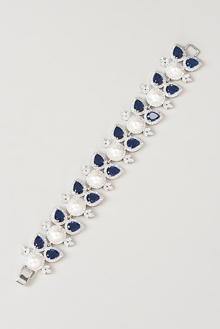 White Finish Faux Diamond & Sapphire Stone Bracelet by Aster at Pernia's Pop Up Shop