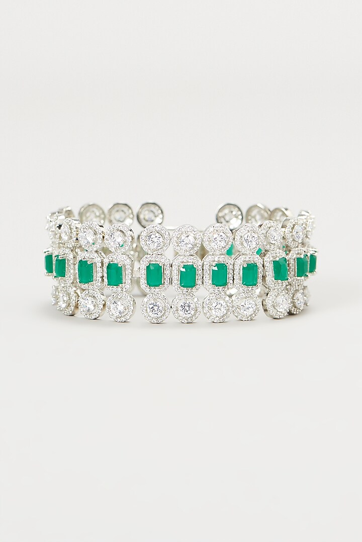 White Finish Faux Diamond & Emerald Bracelet by Aster at Pernia's Pop Up Shop