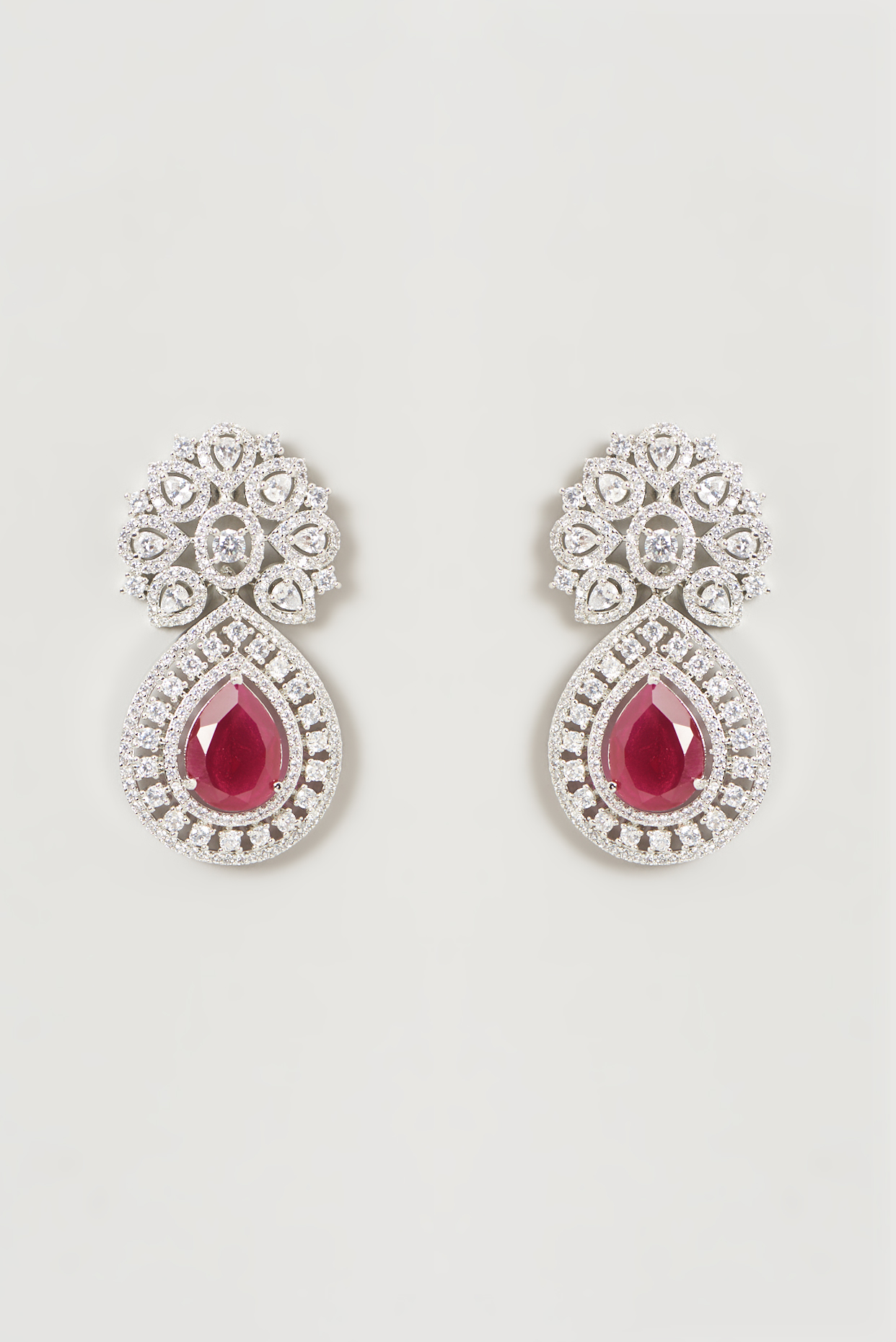 White Finish Faux Diamond & Ruby Dangler Earrings by Aster