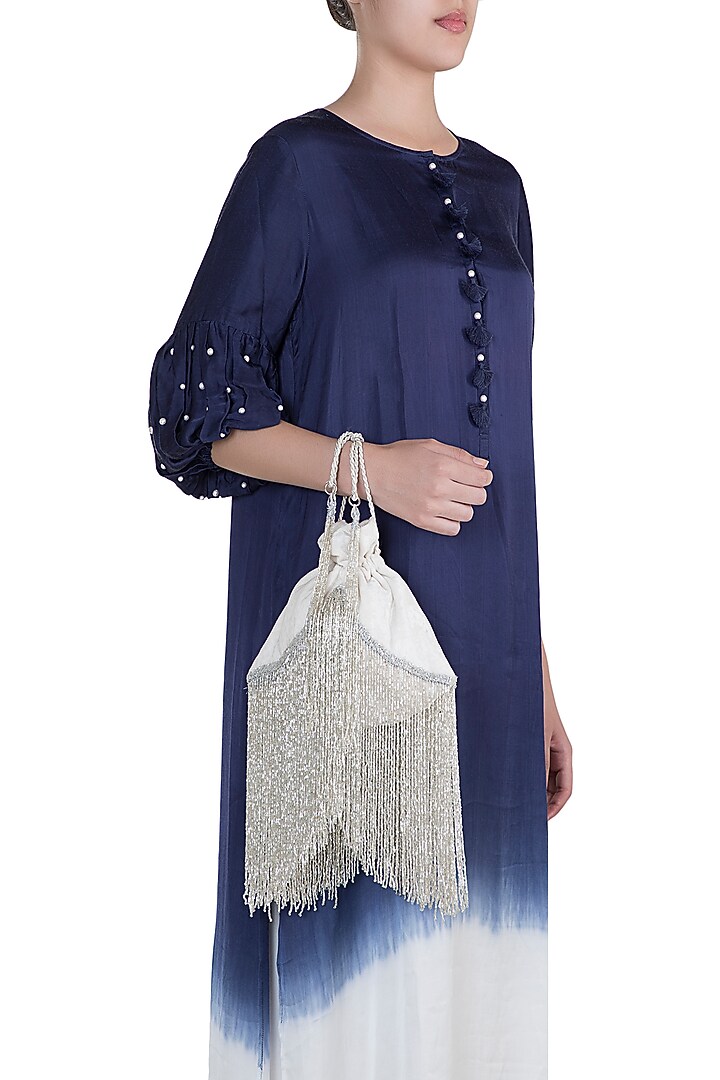 Ivory Embellished Tassel Potli by Aanchal Sayal at Pernia's Pop Up Shop