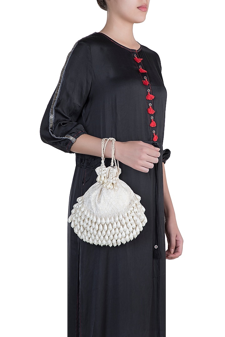 Beige Embroidered Oyster Potli by Aanchal Sayal at Pernia's Pop Up Shop