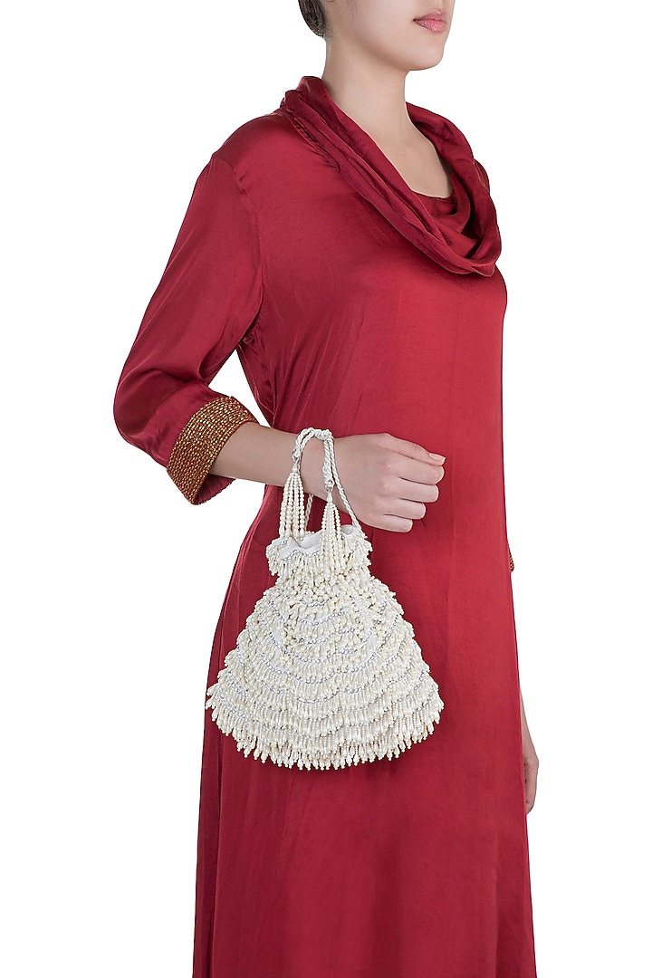 Ivory Embellished Oyster Potli by Aanchal Sayal at Pernia's Pop Up Shop