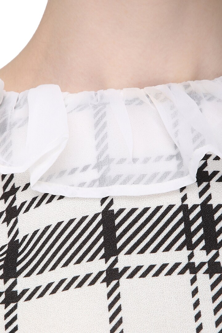 Black and white tartan print knee length dress available only at Pernia's Pop Up Shop.