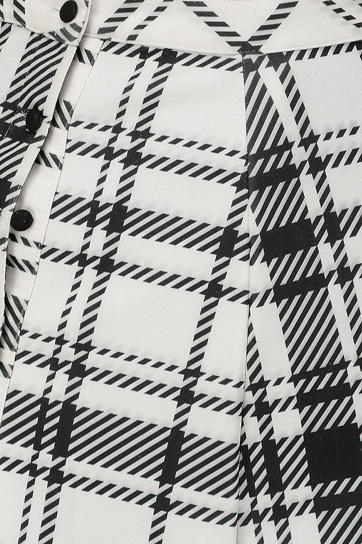 White and black trimmed skirt available only at Pernia's Pop Up Shop.