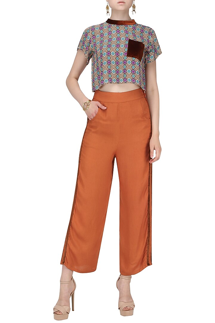 Dark orange striped trousers available only at Pernia's Pop Up Shop.