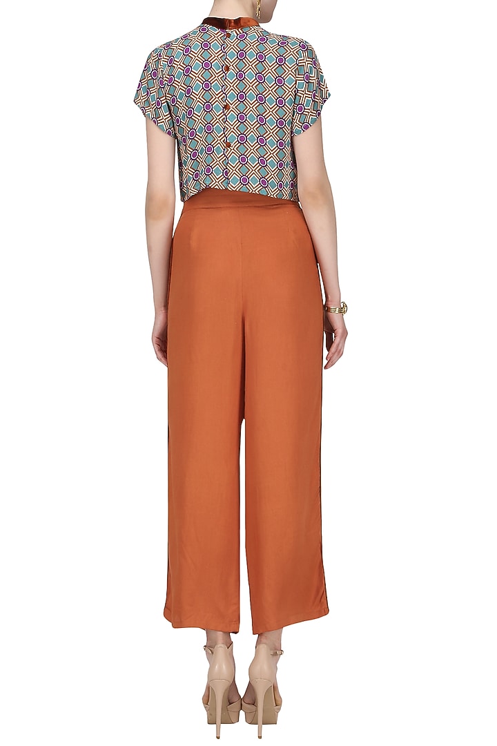 Dark orange striped trousers available only at Pernia's Pop Up Shop.