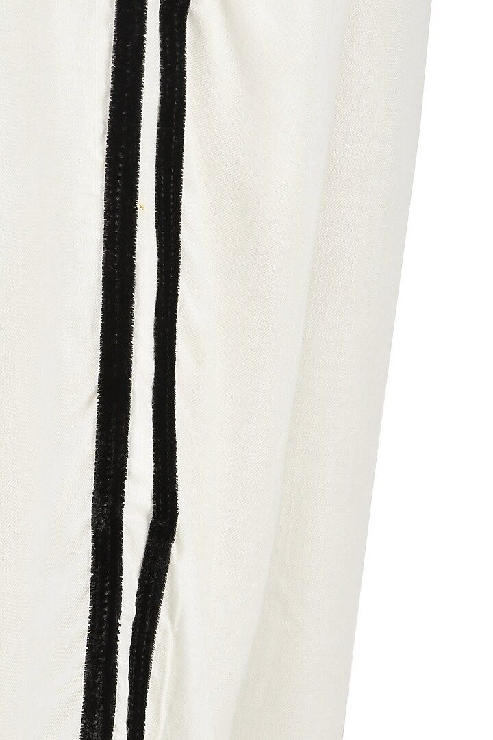 White striped trousers available only at Pernia's Pop Up Shop.