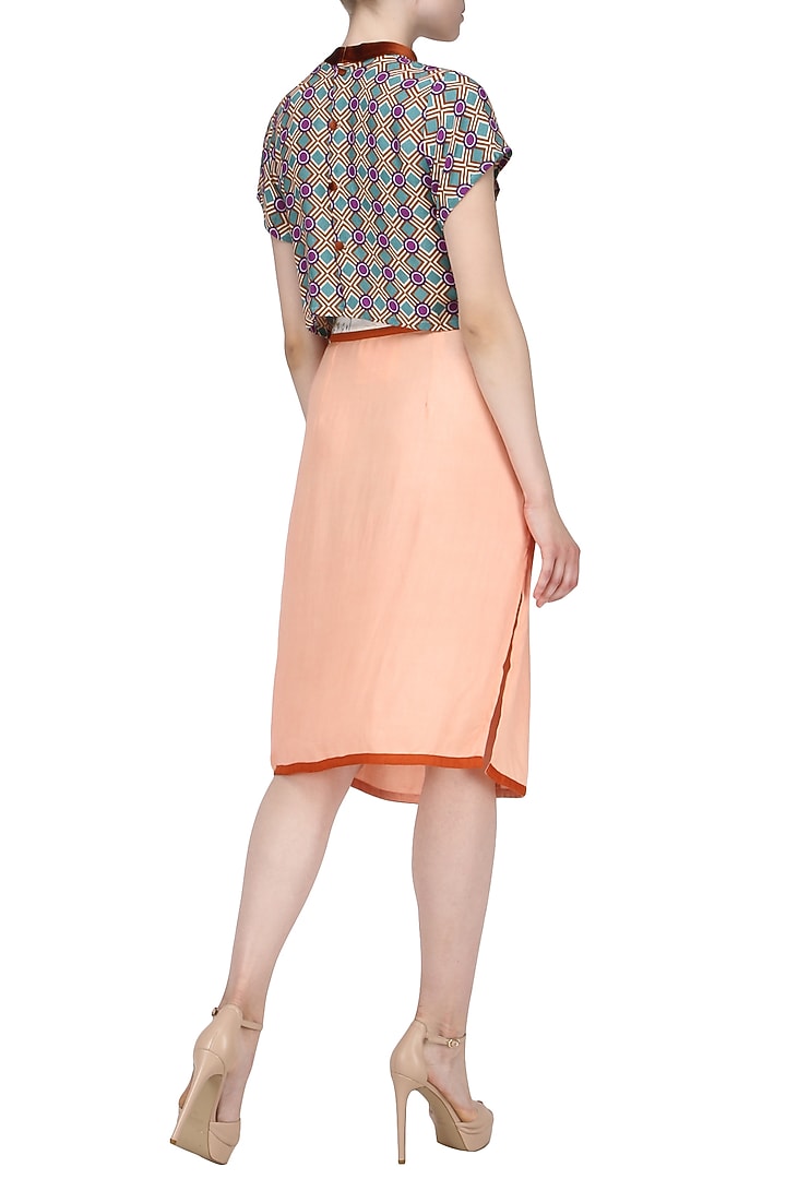 Peach skirt with thigh high slit available only at Pernia's Pop Up Shop.