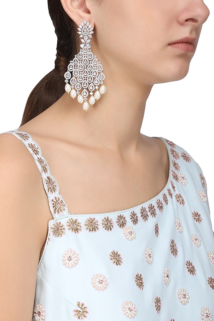Silver finish white zircons and pearl dangler earrings available only at Pernia's Pop Up Shop.