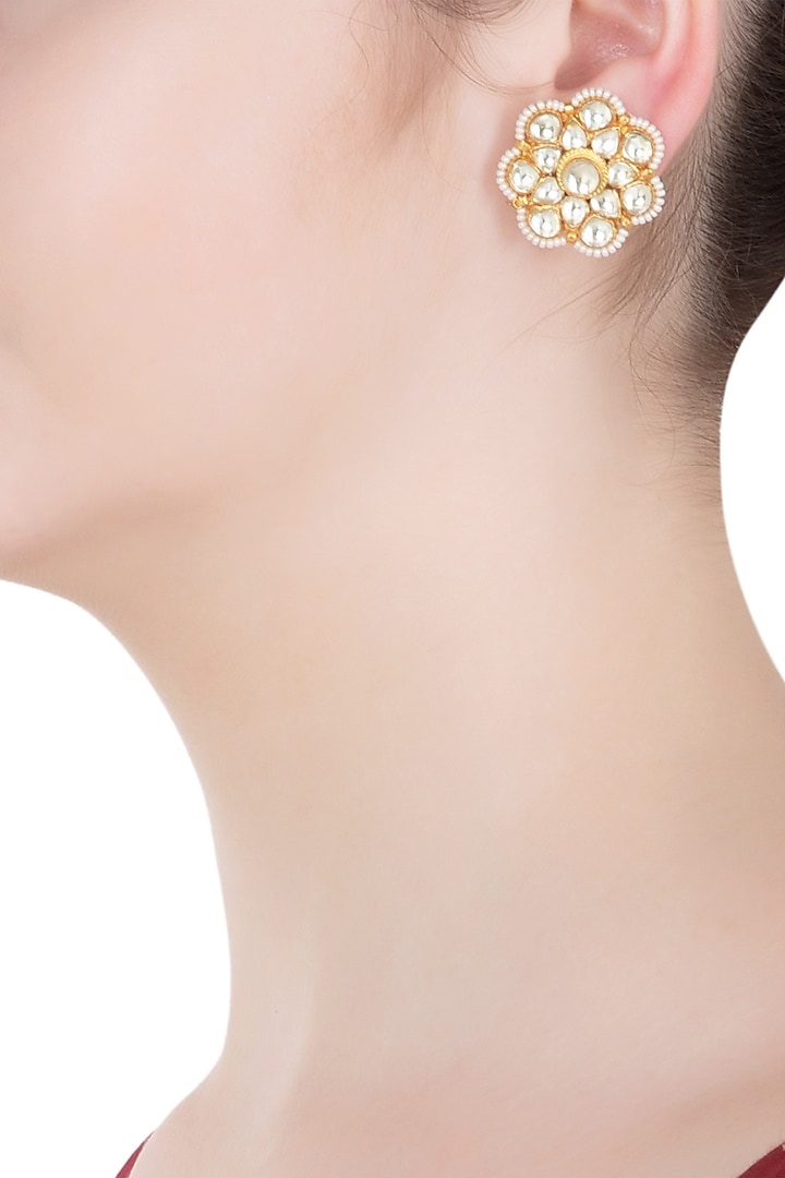 Gold finish kundan and pearls stud earrings available only at Pernia's Pop Up Shop.